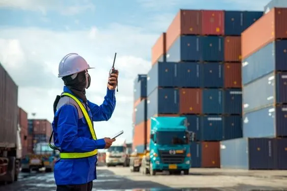 Heavy consignment loading using specialized logistics machinery in Trivandrum