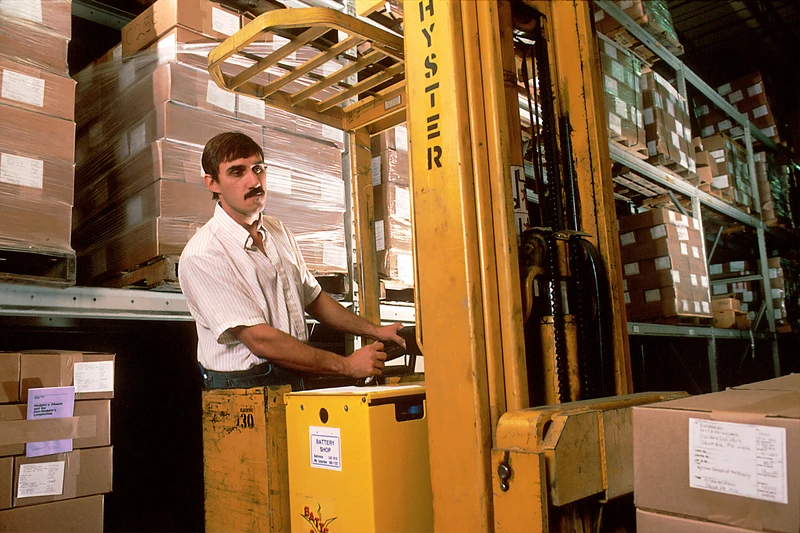 Freight trucks loaded at a warehouse logistics dock