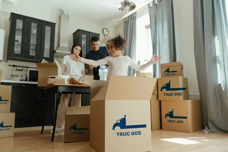 Movers carrying boxes for a residential move in Trivandrum
